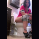 An attactive woman with dark hair sits on a toilet, pisses, and takes a shit with audible plops and pooping sounds. Vertical format video. About 4 minutes.